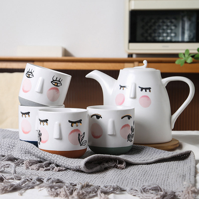 Hand drawn cartoon face ceramic tea set from Qingfa Ceramics