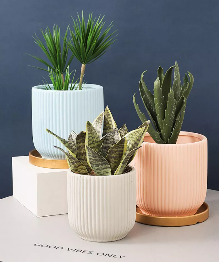 Vertical pattern flower pots in various colors