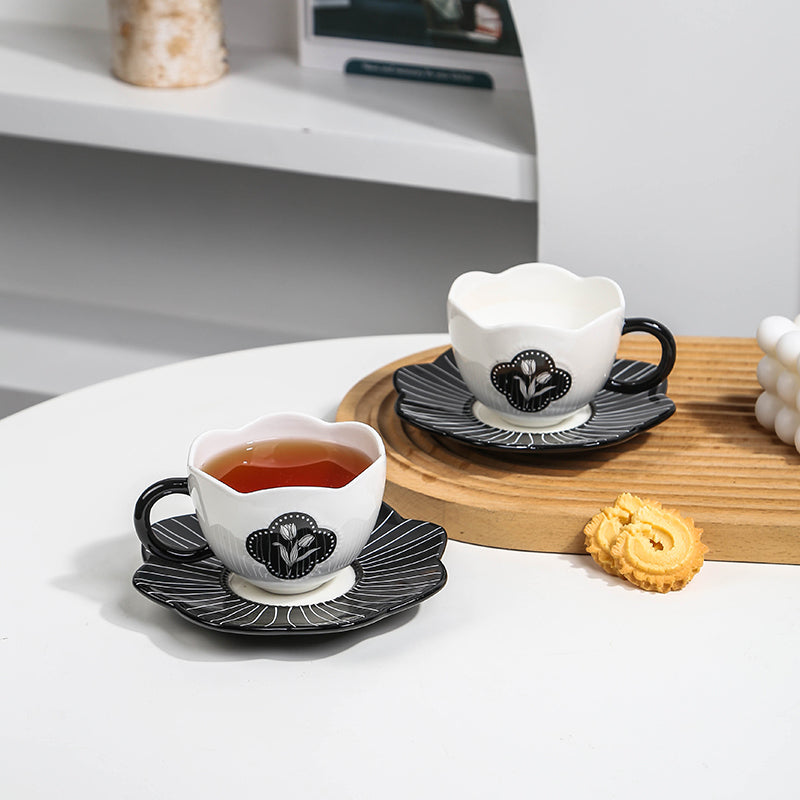 Black and white tulip petal rim cup and saucer set