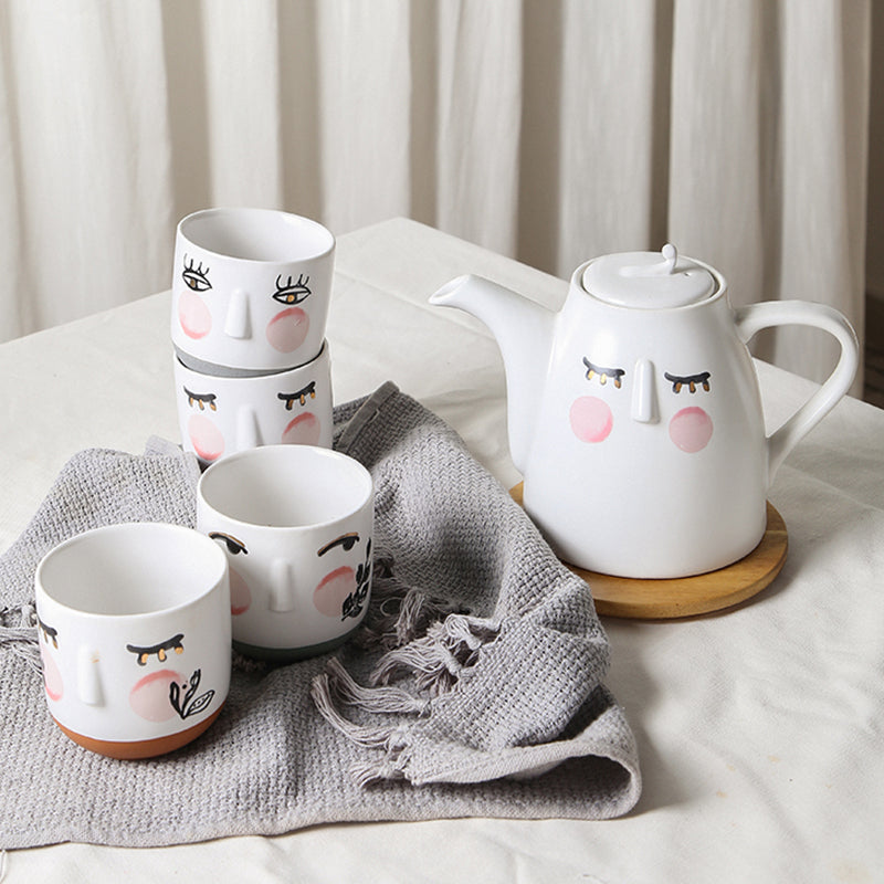 Watercolor style cute face teapot set