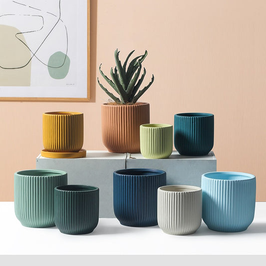 Vertical pattern flower pots in various colors