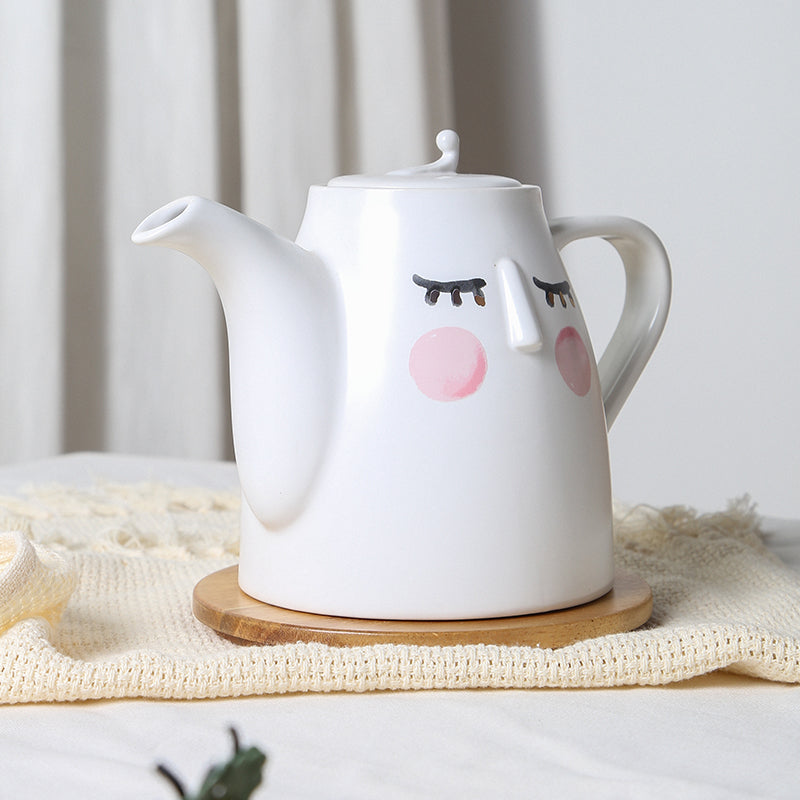 Watercolor style cute face teapot set