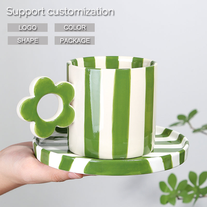 Creative cup with striped pattern petal handle