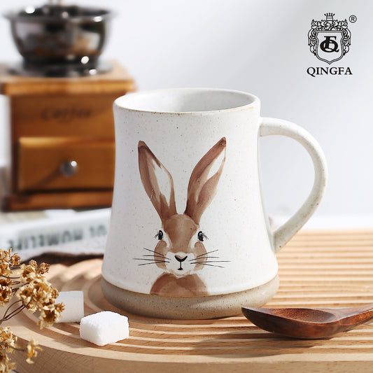 Taza creativa con patrón de conejo pintado a mano estilo gres