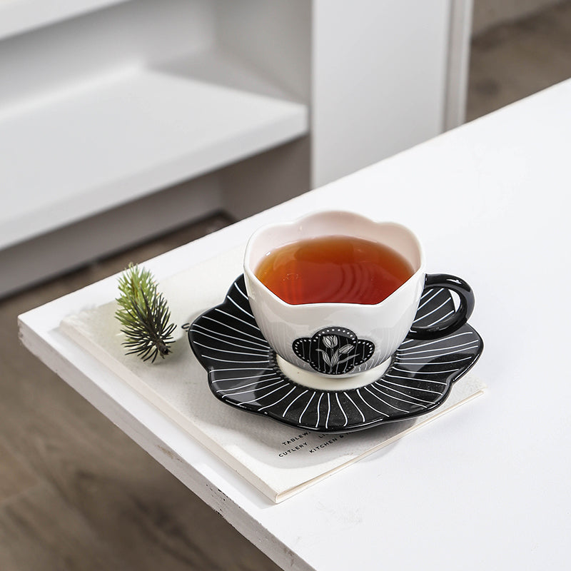 Black and white tulip petal rim cup and saucer set