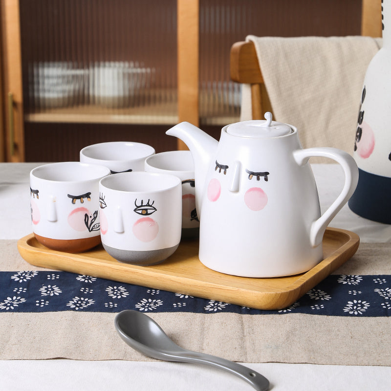 Watercolor style cute face teapot set