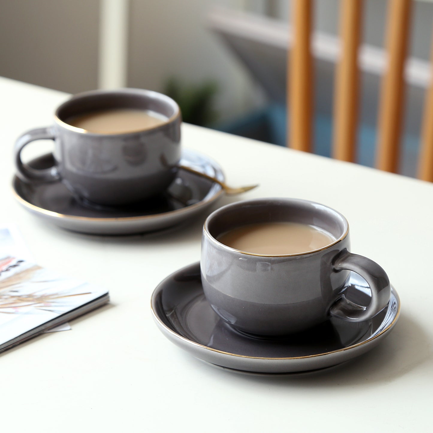 Glossy gray classic cup and saucer