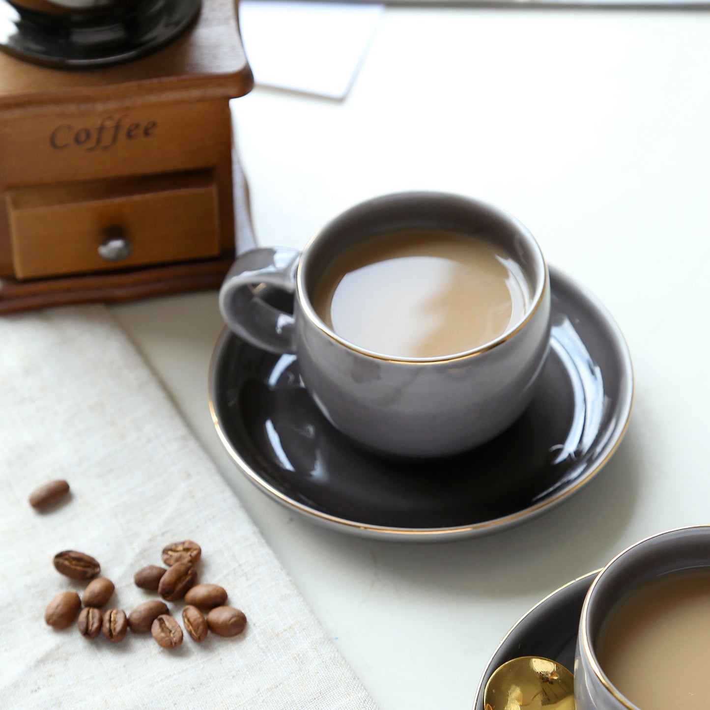 Glossy gray classic cup and saucer