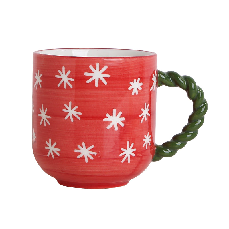 Juego de tazas estilo navideño.